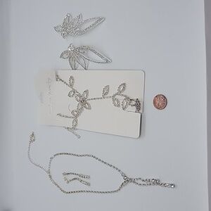 Formal clear rhinestone 4 piece set. Cascading necklace earrings braclet ring